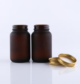 Tawny wide mouth medicine bottle solid bottle